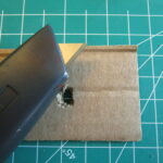 Hole made with a box cutter